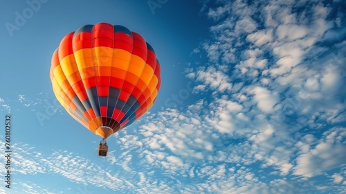 Hot Air Balloon Soaring in Blue Sky
