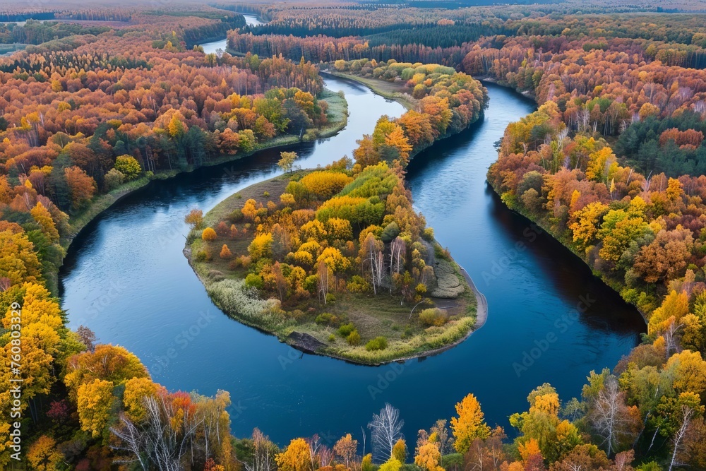 Breathtaking aerial view of a winding river through colorful autumn forests Showcasing the beauty of seasonal change for nature or photography themes.