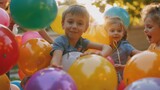 A group of children playing with colorful balloons at a birthday party