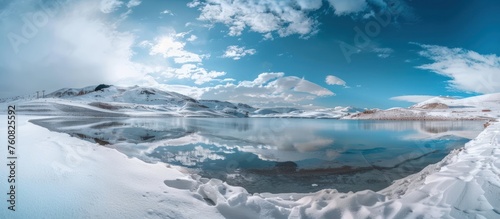 snow covered mountain lake