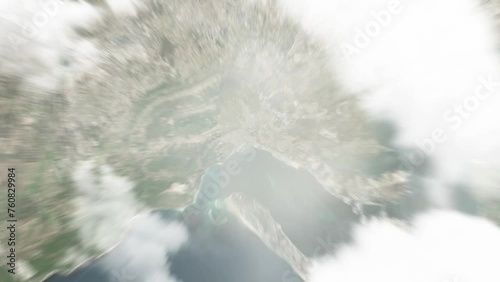 Earth zoom in from space to Setubal, Portugal. Followed by zoom out through clouds and atmosphere into space. Satellite view. Travel intro. Images from NASA photo