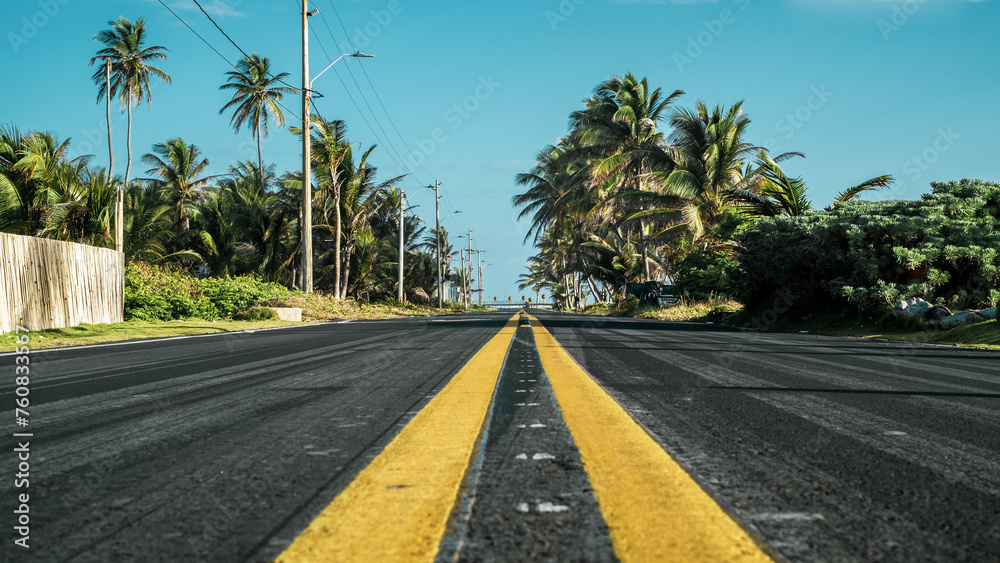 Perspecive of a road in a tropical island. San Andrés, Colombia. Perspecive of a road in a tropical island. San Andrés, Colombia.