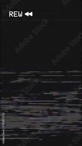 Old VHS Tape Display REW Rewind Analog TV - Retro Vintage Abstract Noise Background Loop - Vertical Video photo