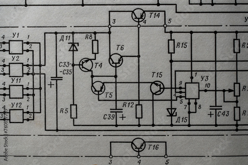Old radio circuit printed on vintage paper electricity diagram as background. Electric radio scheme from USSR
