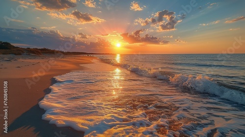 Sun Setting Over Water at Beach © olegganko