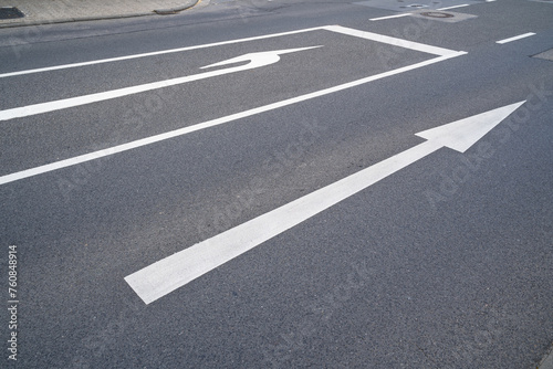 City street with huge white arrows