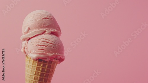 a pink ice cream cone with a scoop of ice cream in the middle of it on a pink and pink background. photo