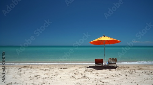 Serene Beach Scene with Vibrant Orange Umbrella and Chair