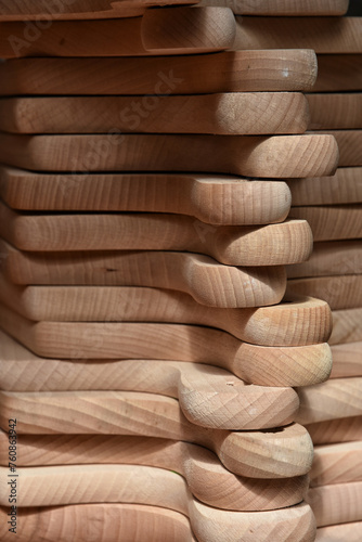 Stack of wooden kitchen boards at market stall