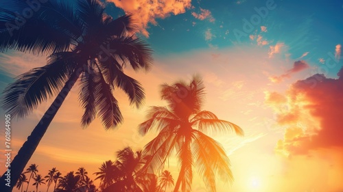 Tropical palm trees against a sunset sky - Warm hues cast a golden glow over silhouetted palm trees, depicting a tranquil tropical sunset paradise © Tida