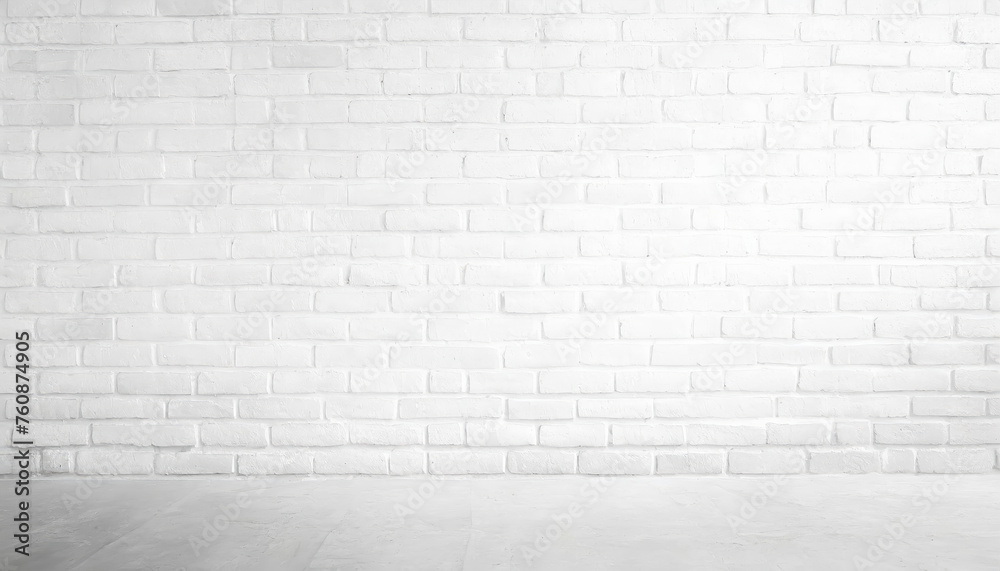 A brick wall with a large empty space in the middle. The wall is white and has a rough texture