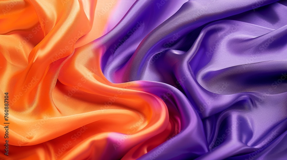 Obraz premium Warmth and richness in orange and purple fabric texture. Vibrant undulating silky texture in deep hues. Elegant silk folds in a luxurious blend of orange and purple.