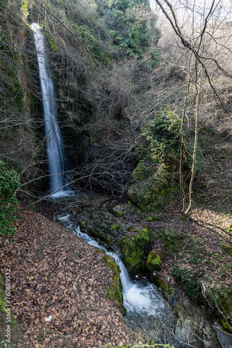 Babadag Yardan Waterfall. Yardan waterfall in mountain forest under blue sky. Babadag, Denizli, Turkey. photo