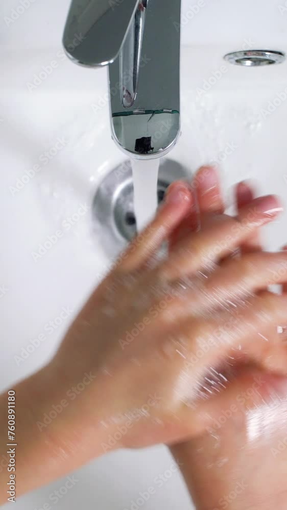 Vidéo Stock Little girl washing hands in bathroom at home, Coronavirus