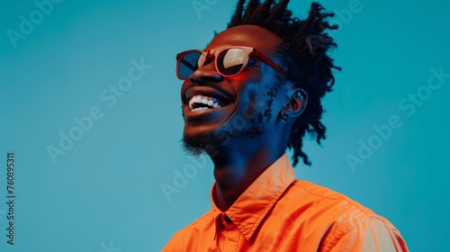 portrait of a black cheerful man with dreadlocks