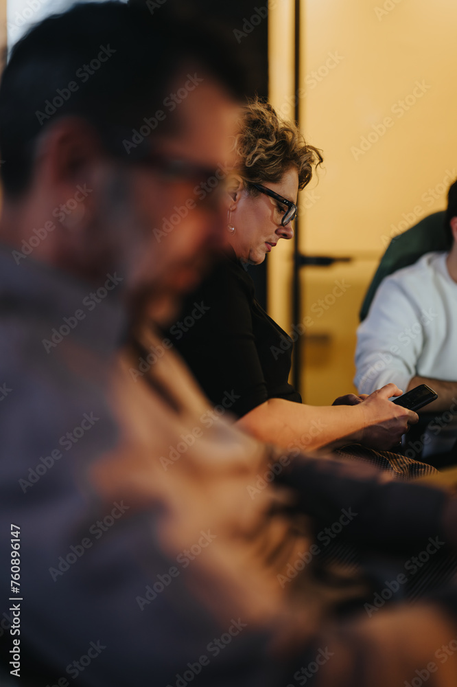 Inter generational professionals in an office meeting, discussing business growth and market expansion, collaborating on a project for success. Inter generational professionals in an office meeting, discussing business growth and market expansion, collaborating on a project for success.