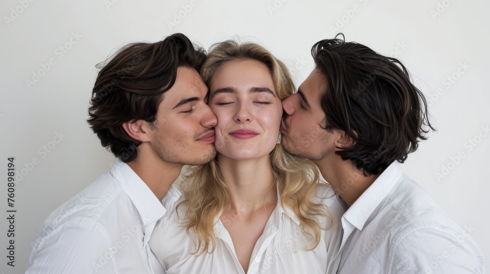 Blond woman in a white shirt kissed by two brunette men. Trio relationship concept. Intimate moment in a romantic trio. Contemporary love and intimacy. Complex relationships and connection. Polygamy. Blond woman in a white shirt kissed by two brunette men. Trio relationship concept. Intimate moment in a romantic trio. Contemporary love and intimacy. Complex relationships and connection. Polygamy.