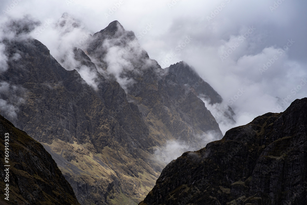 mountains in the morning with fog and clouds