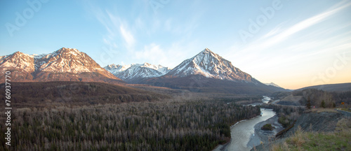 Obraz na plátně Blue sky over Matanuska River flowing  past Chugach Mountains near Palmer Alaska
