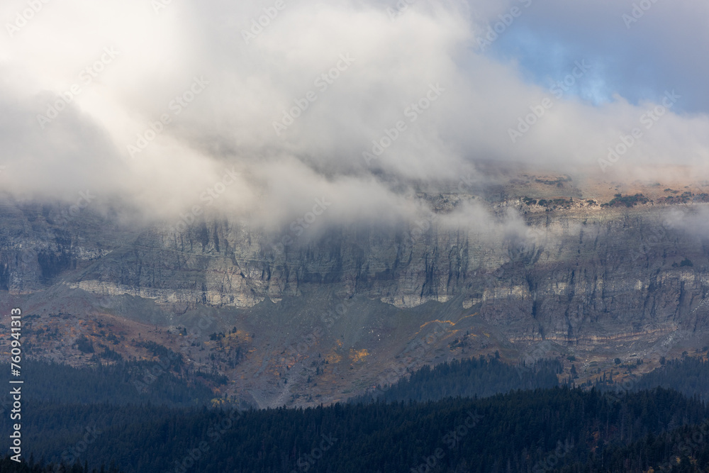 The sky is cloudy and the mountains are covered in snow The sky is cloudy and the mountains are covered in snow