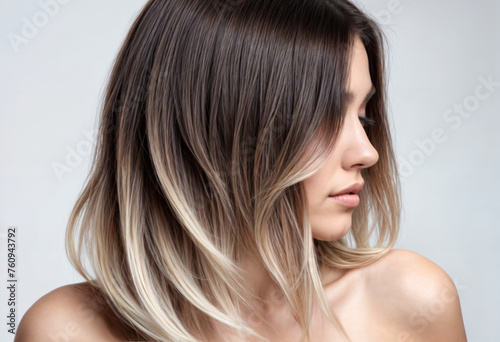 Subtle Balayage Technique on Woman's Soft Wavy Brown Hair