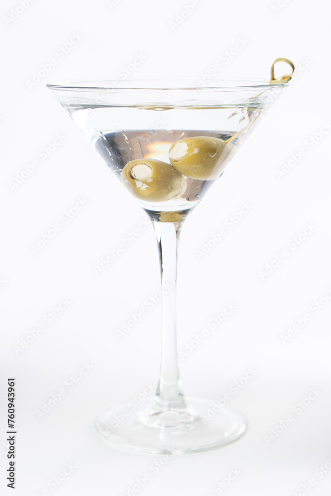 Chilled gin martini with bleu cheese stuffed olives