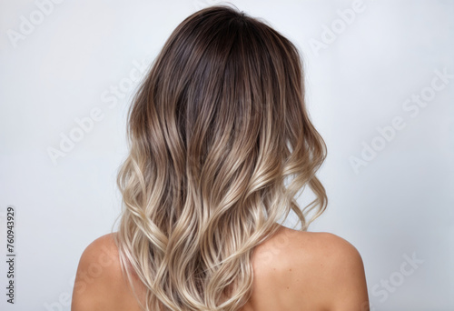 Wavy Blonde Ombre Hair on a Woman with Subtle Makeup