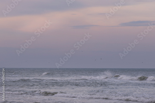 A scenic view of waves on the Atlantic Ocean in Kure Beach, North Carolina. © jdwfoto