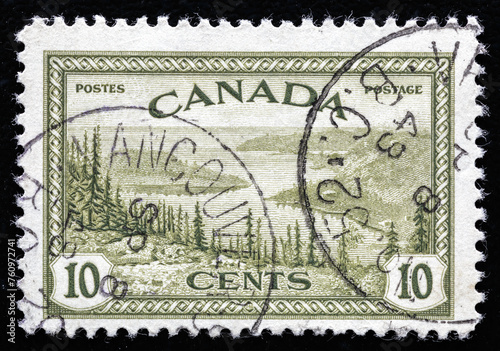Ukraine, Kiyiv - February 3, 2024.Postage stamps from Canada.A stamp printed in the Canada shows Great Bear Lake, Mackenzie, circa 1946