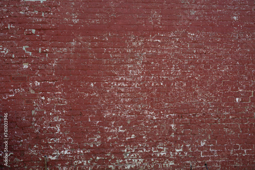 Peeling red painted wall