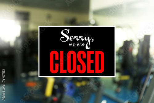 Sorry we are closed sign against blurred background