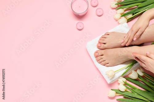 Closeup of woman with neat toenails after pedicure procedure on pink background, top view. Space for text © New Africa