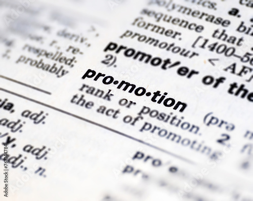 Closeup of the word promotion in the dictionary