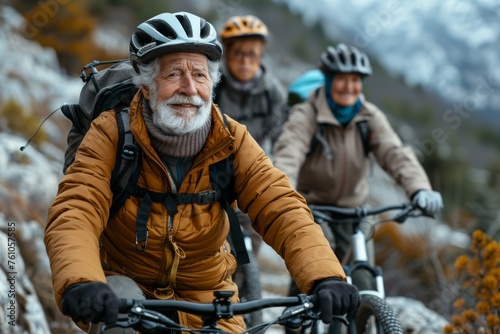 A group of elderly friends biking in cool weather.