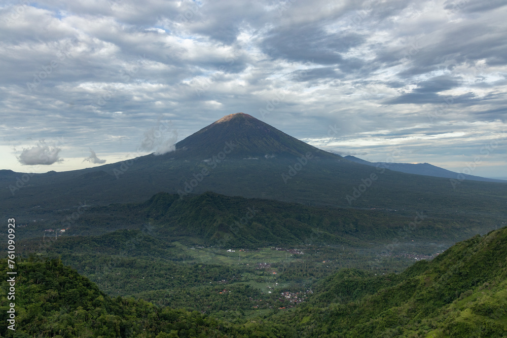 Scenic mount Agung volcano view observed from a famous Lahangan Sweet viewpoint in Karangasem district of a tropical Bali island