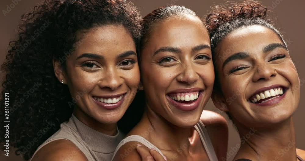 Face, women and group with skincare, smile and dermatology on a brown studio background. Models, laughing and portrait with wellness and dermatology with luxury and funny with healthy skin and beauty