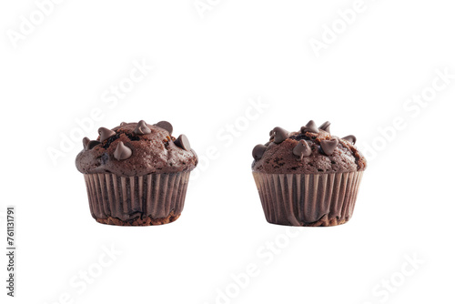  An irresistible and delicious double chocolate chip muffin cake on left of frame isolated against white background first person view realistic daylight