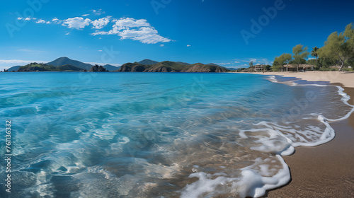 Deserted sunny beach with palms, yellow sand and light blue water. Concept of a paradise