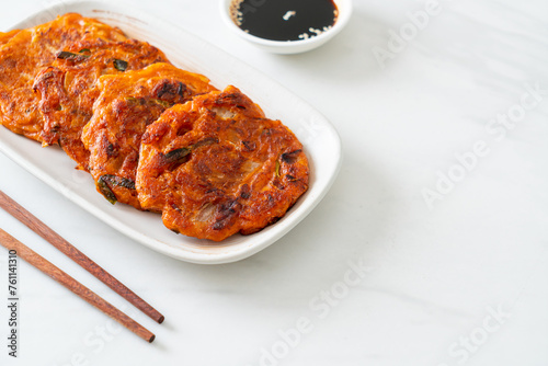 Korean Kimchi pancake or Kimchijeon - Fried Mixed Egg, Kimchi, and Flour