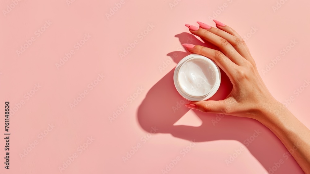 closed up hand and cream jar. Beautiful woman applying skin care cream from white cream jar, Set for spa, skin care and body products and solutions for skin problems such as scars, acne, wrinkles..