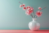 White Vase Filled With Pink Flowers on Table