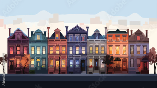 A row of brownstone rowhouses at twilight  photo
