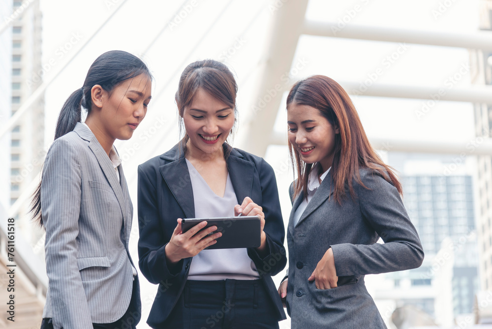 Businesswomen Partner use digital tablet online meeting team Partnership businesswoman talking together. Diversity group Asian Business women Partner trust teamwork. Asian Business team using tablet Businesswomen Partner use digital tablet online meeting team Partnership businesswoman talking together. Diversity group Asian Business women Partner trust teamwork. Asian Business team using tablet