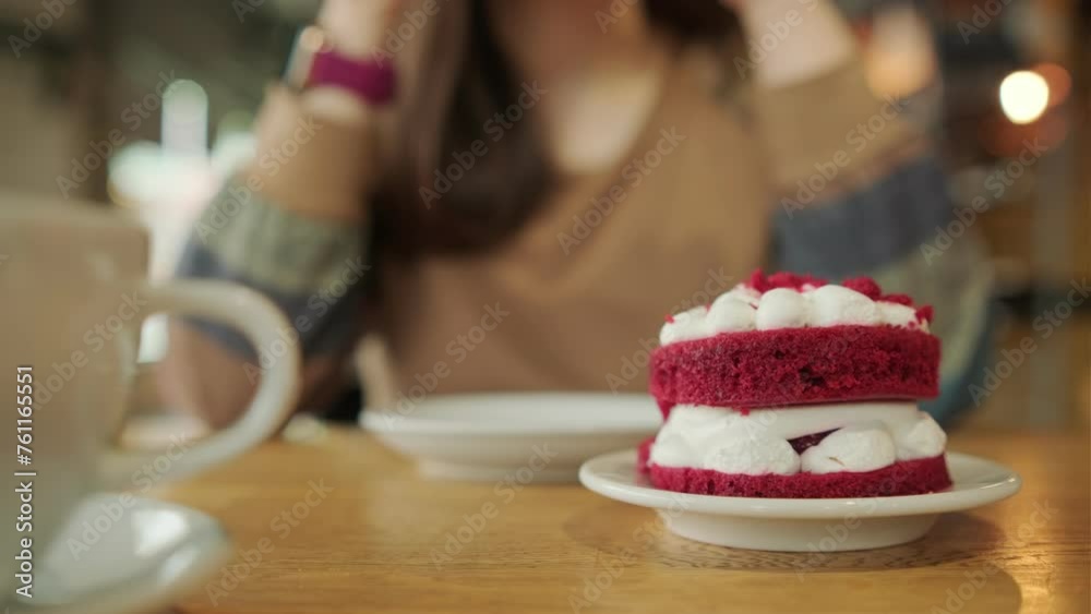 A red velvet cake with marshmallows arranged on a plate, creating a tempting dessert display. A red velvet cake with marshmallows arranged on a plate, creating a tempting dessert display.