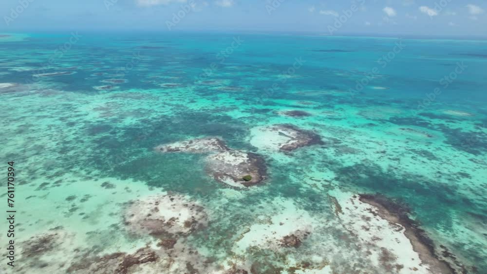 Aerial 360 pan over Los Roques' vibrant green waters and mangroves, daylight Aerial 360 pan over Los Roques' vibrant green waters and mangroves, daylight