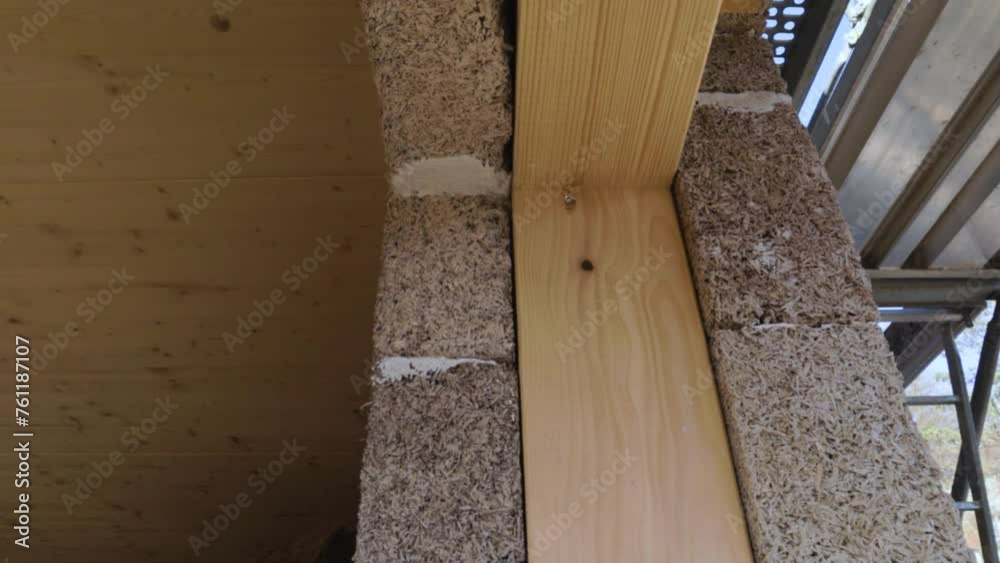 Slow panning from inside to outside of window jamb in a hempcrete wall build with hemp bricks Slow panning from inside to outside of window jamb in a hempcrete wall build with hemp bricks
