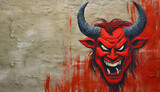 Devil face on a wall