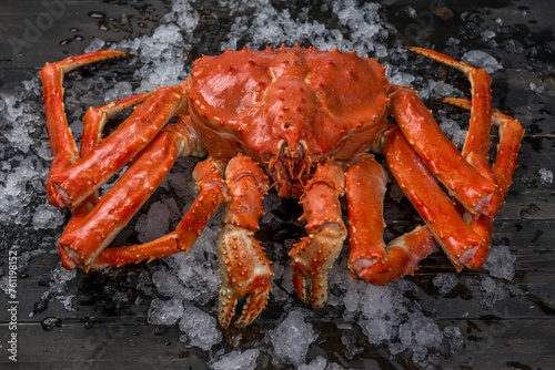 cooked crab on a black background