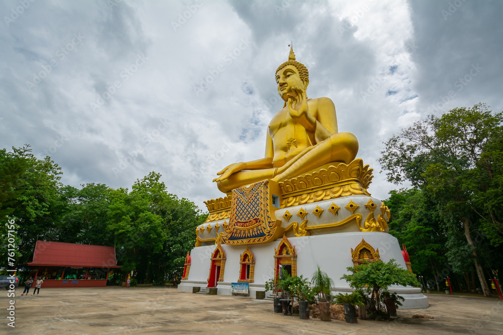 Big Gold Buddha statue at Wat Pha Thang, Uthai Thani, Thailand