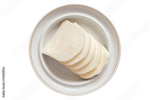 Sliced homemade cheese on a plate. Cheese on a white background. Top view.